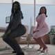 She-Hulk and Megan Thee Stallion shake their butts in a hi-rise lawyer office.